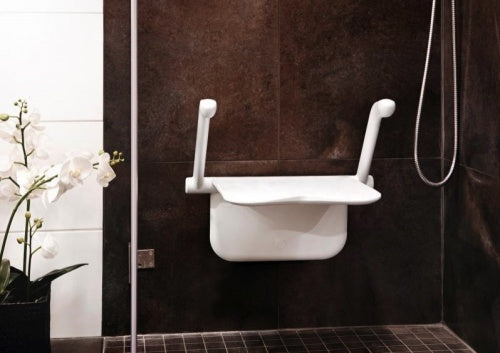The Etac Relax Shower Seat - White in a stylish bathroom