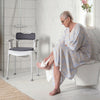 Etac chair in the shower with a woman having just used it