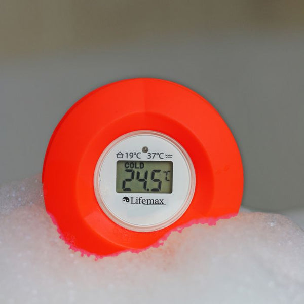 the image shows the lifemax floating bath thermometer in a bubble bath