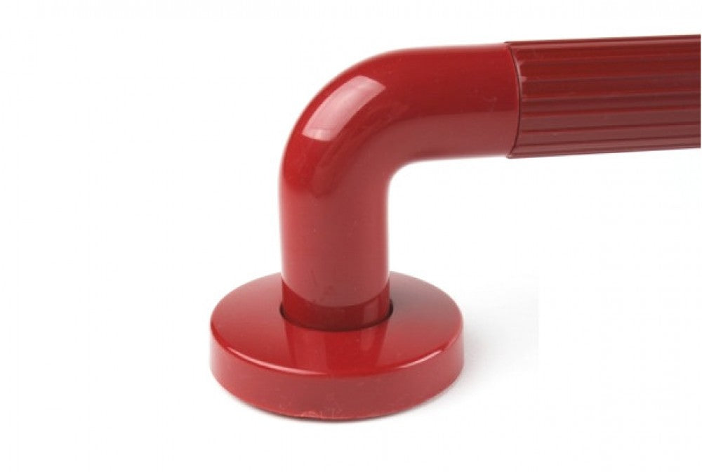 a close up of the curved end of the red fluted plastic grab rail