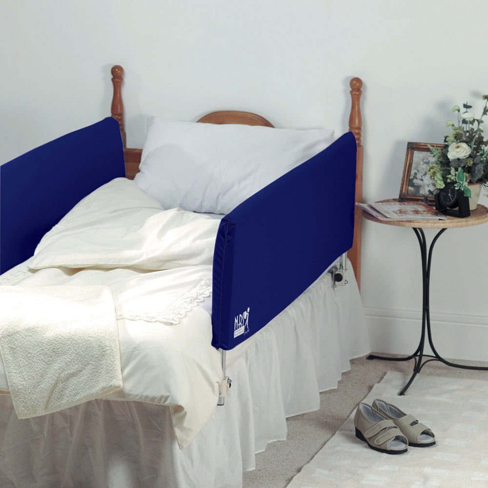 the image shows the bed bumpers fitted over existing bed railings on a single bed