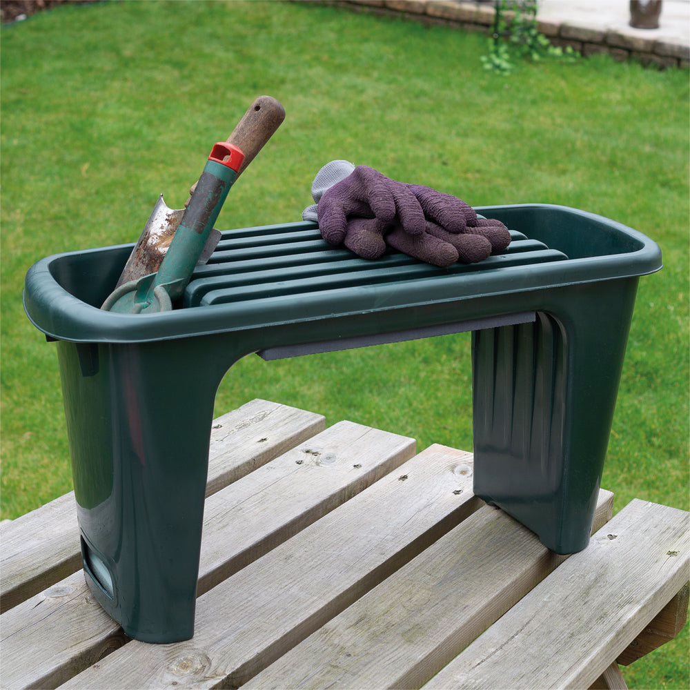 Padded Garden Kneeler in use, gloves and tools resting on it