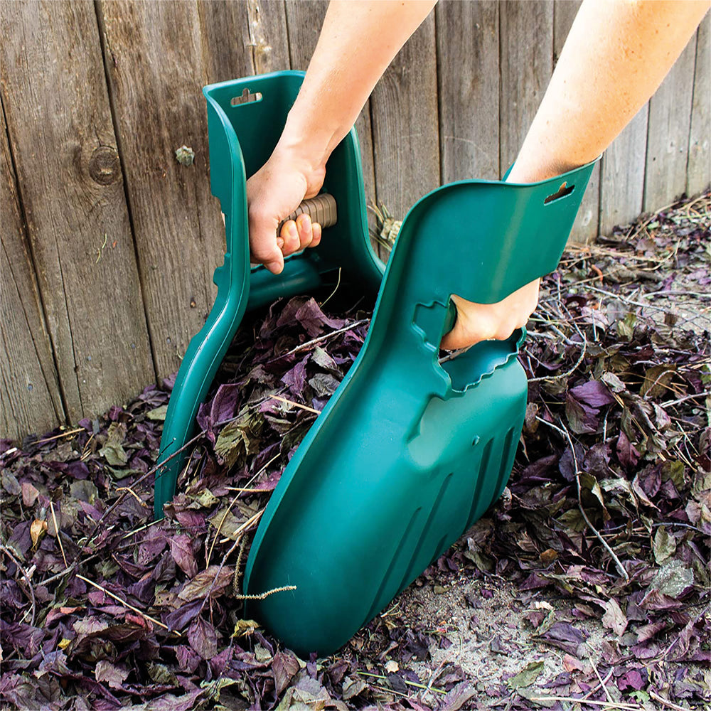 Home and Garden Leaf Grabber in use, scooping up leaves