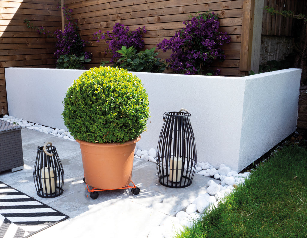 Flower Pot Mover – Square in use, large potted plant resting on it