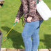 Pump Action Pressure Sprayer in use in garden