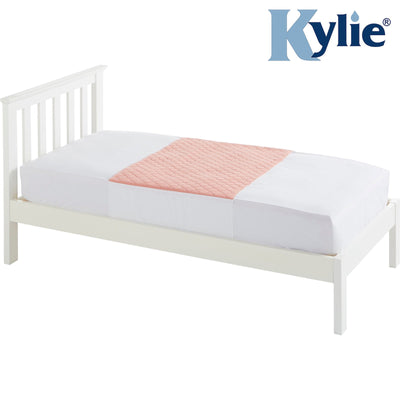 the image shows the pink kylie bed pad on a single bed