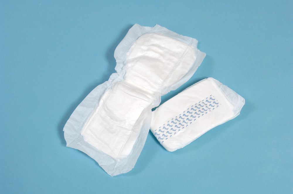 The image shows one Lil Supreme Light Shaped Incontinence Pad opened out and one pad folded over