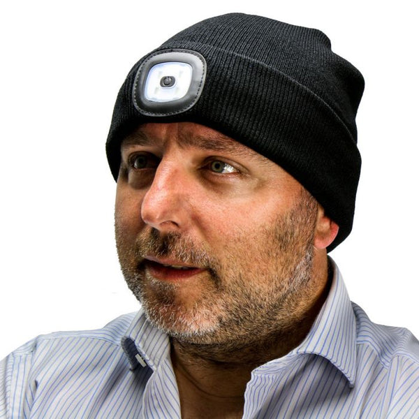 the image shows a man wearing the lifemax lighted hat
