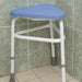 shows the padded corner stool in a wetroom