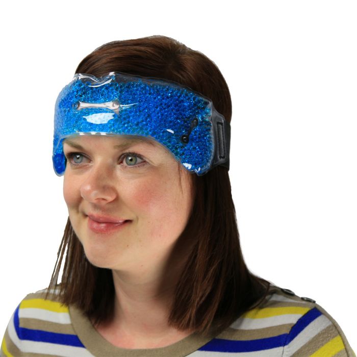 the image shows a young woman wearing the lifemax migraine relief wrap