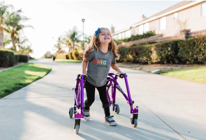 shows the Nimbo Posterior Posture Walker - Small being used