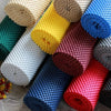 the image shows the eleven different colours of non-slip fabric rolls