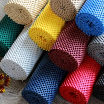 the image shows the eleven different colours of non-slip fabric rolls