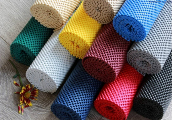 the image shows the eleven different colours of non-slip fabric rolls