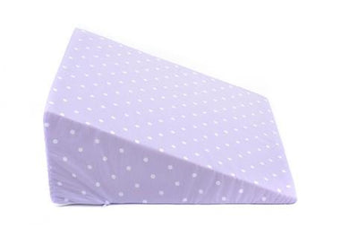 the image shows the 2 in 1 patterned bed wedge in lilac polka dot