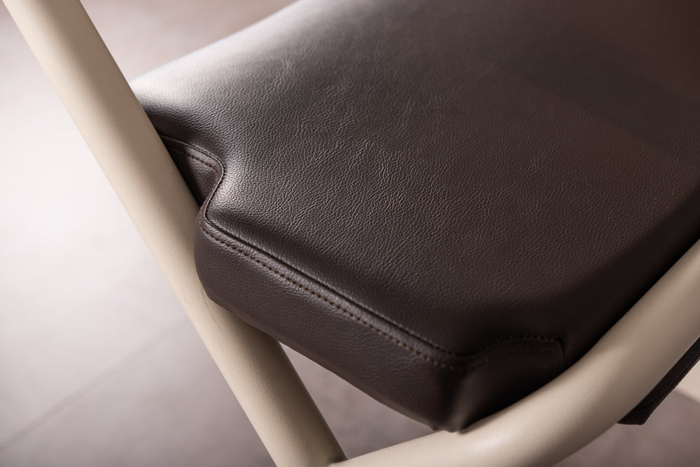 The image shows the dark brown leatherette fabric of the SALJOL Padded Seat for Page Indoor Rollator