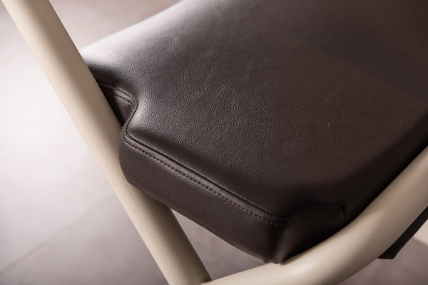 The image shows the dark brown leatherette fabric of the SALJOL Padded Seat for Page Indoor Rollator