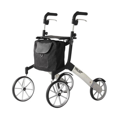 shows the lets go out rollator in black and silver with the bag attached