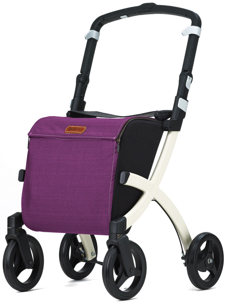 shows one more pictue of a white framed rollz flex rollator with a purple shopping bag