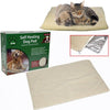 shows the Crufts Self Heating Pet Pad in its box, and also unfolded out of the box. It shows how the cover can be unzipped and removed and it shows a puppy and cat curled up together on the bed