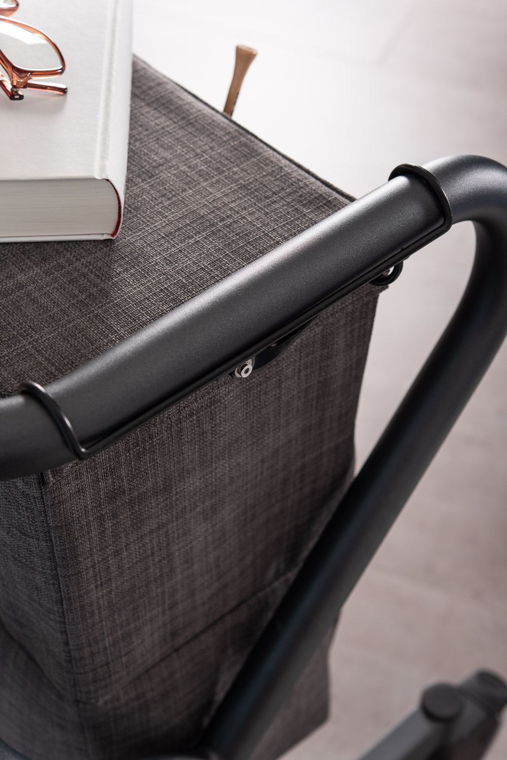 The image shows a close up of the fitting of the SALJOL Bedside Cabinet for Page Indoor Rollator