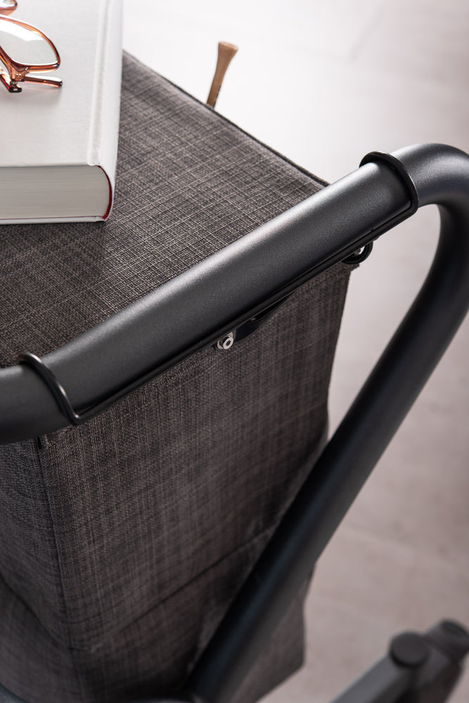 The image shows a close up of the fitting of the SALJOL Bedside Cabinet for Page Indoor Rollator