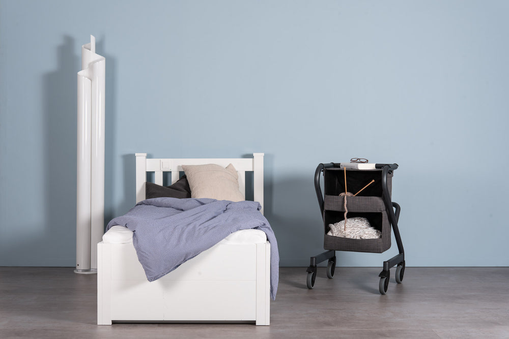 The image shows the SALJOL Bedside Cabinet for Page Indoor Rollator beside a single bed