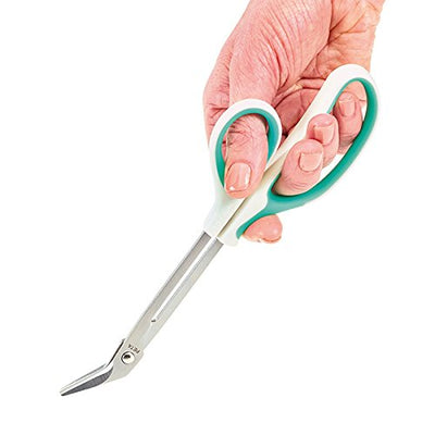 shows a hand holding the green rubberised handled chiropodist toe nail scissors