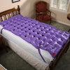 the image shows an ehob mattress single overlay with pump on a bed