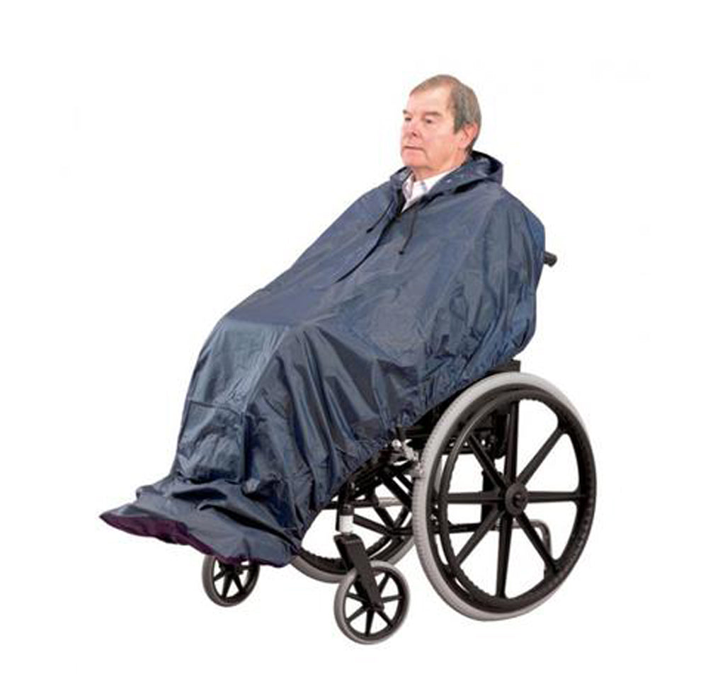 A man in a wheelchair using the Wheelchair Mac Without Sleeves