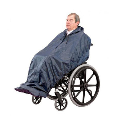 A man in a wheelchair using the Wheelchair Mac Without Sleeves