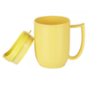 The yellow unbreakable mug with feeder lid